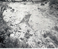 Rubble pile at base of canyon wall after rock slide. Birch Creek.