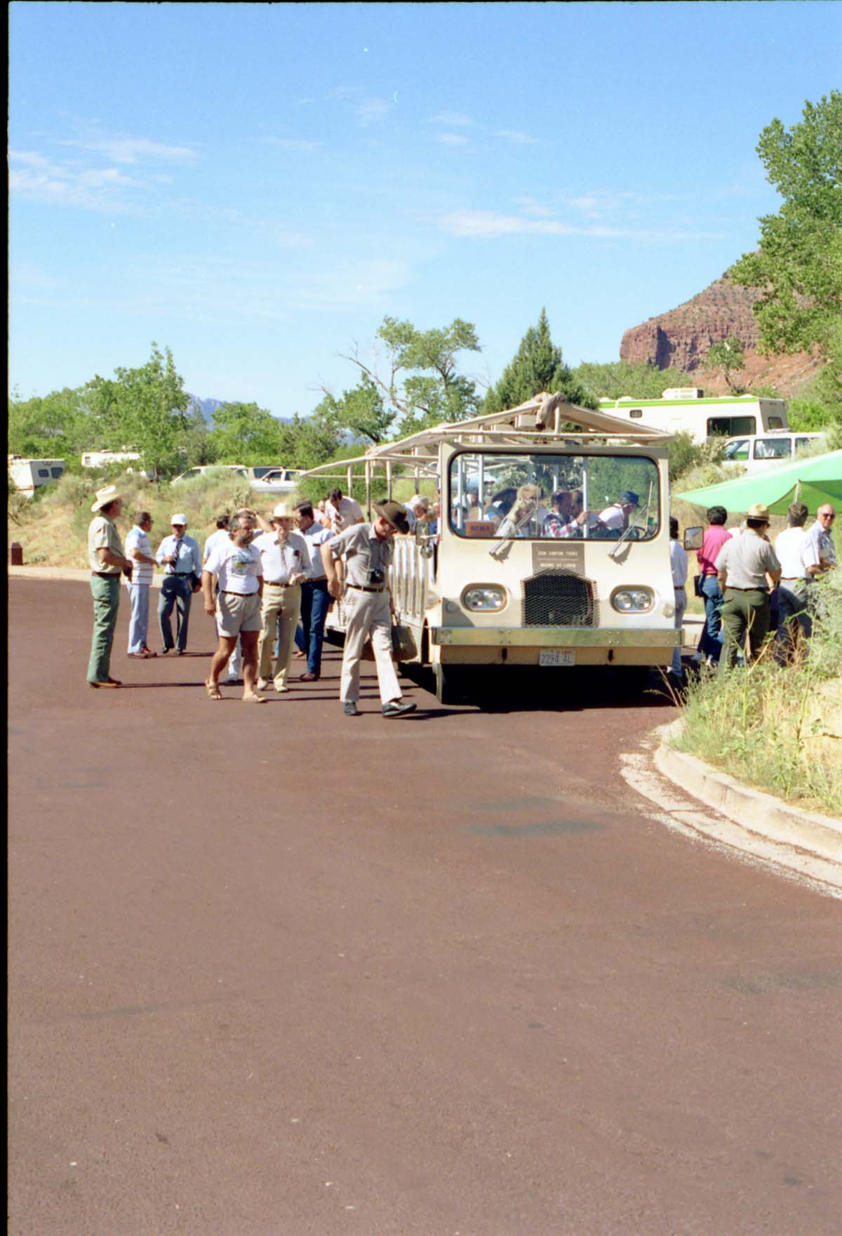 Color Photos of the parks 72nd anniversary celebrations- cake cutting, barbecue, speakers.
