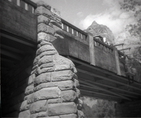 Canyon Junction vehicle bridge with men working on railing.