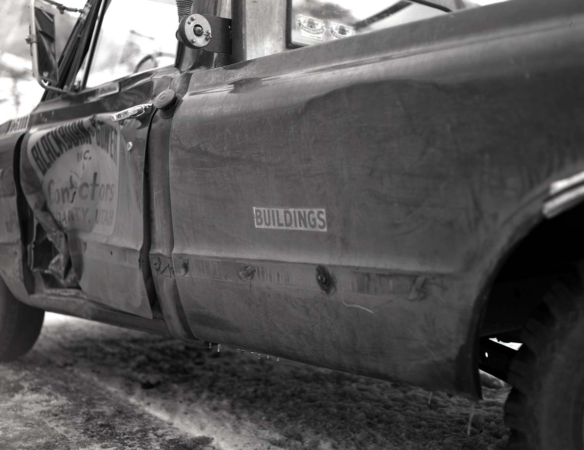 Snowplow accident, county line curve along East Entrance road showing vehicle that slid into snow plow.
