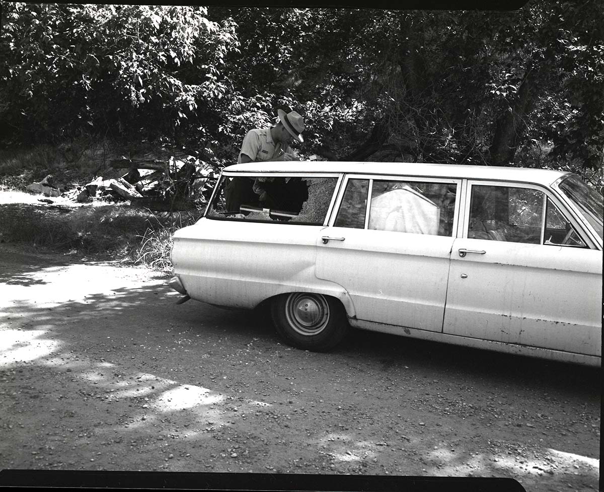 Falcon station wagon involved in accident at Zion Lodge with Utah Parks Company garbage truck.
