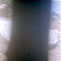 Rock pile covered with tarp during road work/repair in Kolob Canyon.