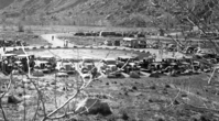 Vehicles parked near the South Campground amphitheater during the 1936 Zion Easter church service.