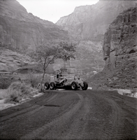 Tractor performing road work on the Great White Throne parking area.