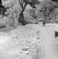 Men performing road work along the scenic canyon drive near the Grotto.