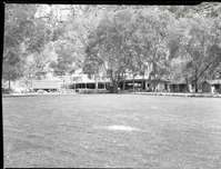 Rebuilding Zion Lodge after fire of January 28, 1966 - walls and ceilings of much of lodge in place.