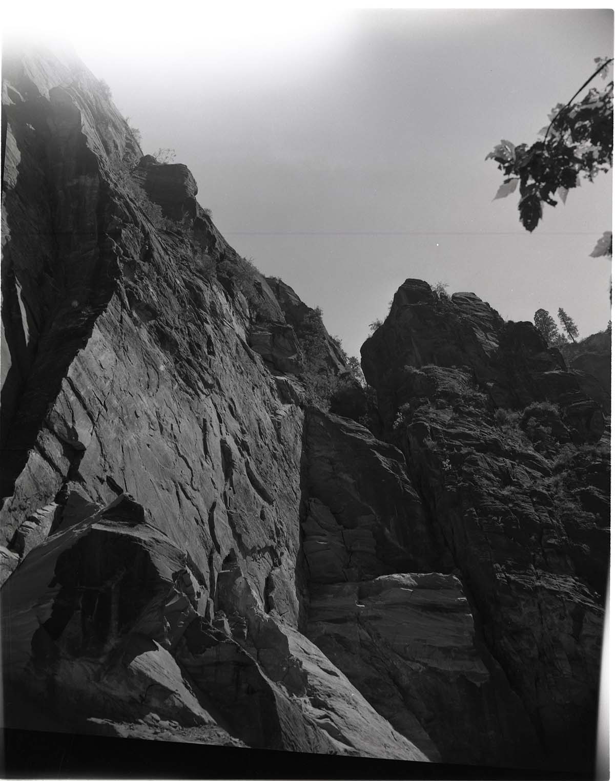 BW photo of a rock slide along the Narrows Trail.