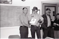 BW Photos of Superintendent Harold Grafe giving out awards to park personnel.
