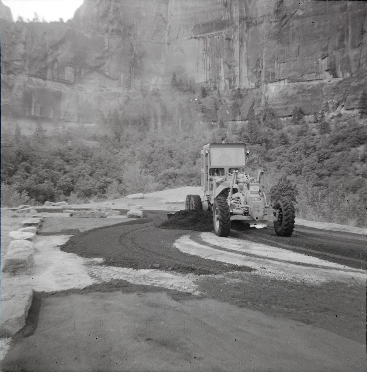 Tractor performing road work on the Great White Throne parking area.