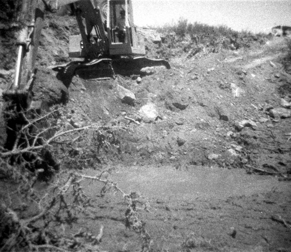 BW photos of rock slides in Kolob Canyons - 110mm. Trackhoe clearing debris.
