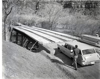 Oak Creek Bridge construction showing supports and planking for bed on which concrete will be poured.