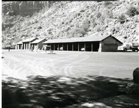 Road repair and completed paving in utility area.