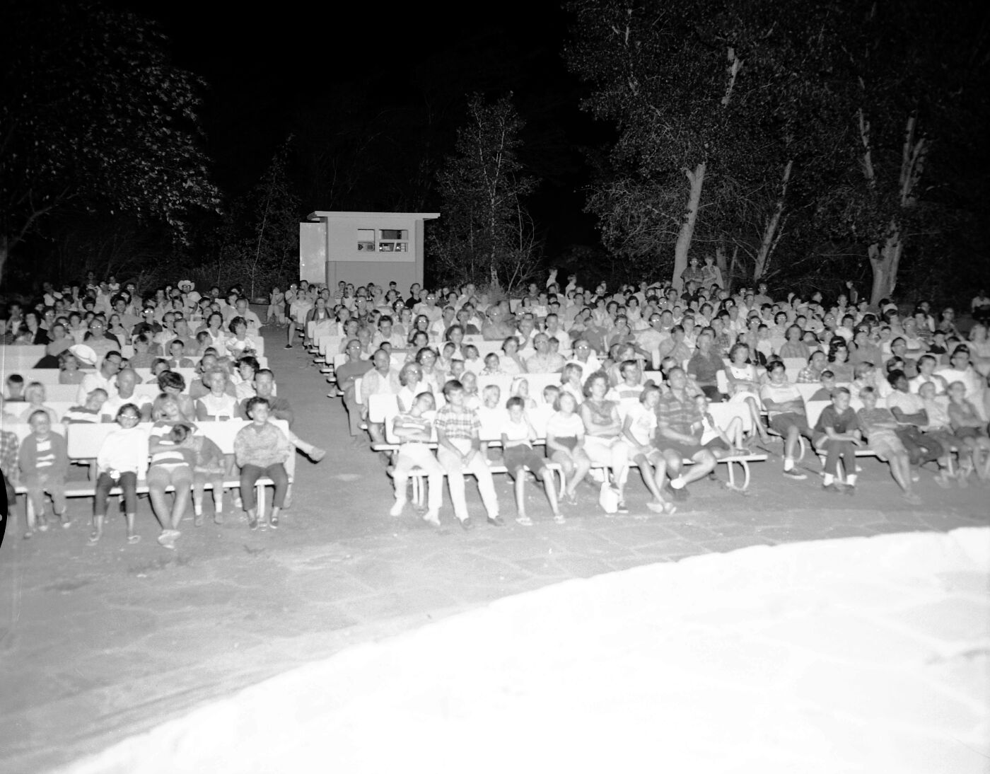 Campers enjoying evening program at South Campground amphitheater.