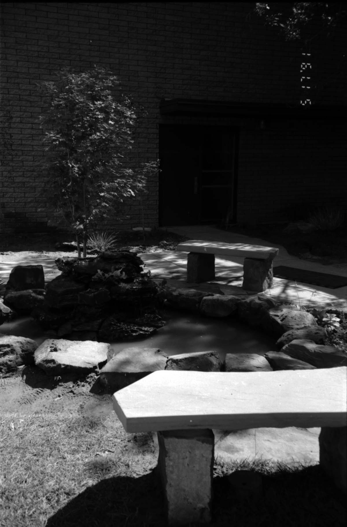 Water fixture in the courtyard are in headquarters during the construction of headquarters addition.