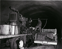 Crews and equipment drilling test cores in Zion-Mt. Carmel tunnel.