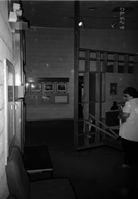 Visitor viewing the interpretive display in the old Mission 66 Visitor Center and Museum.