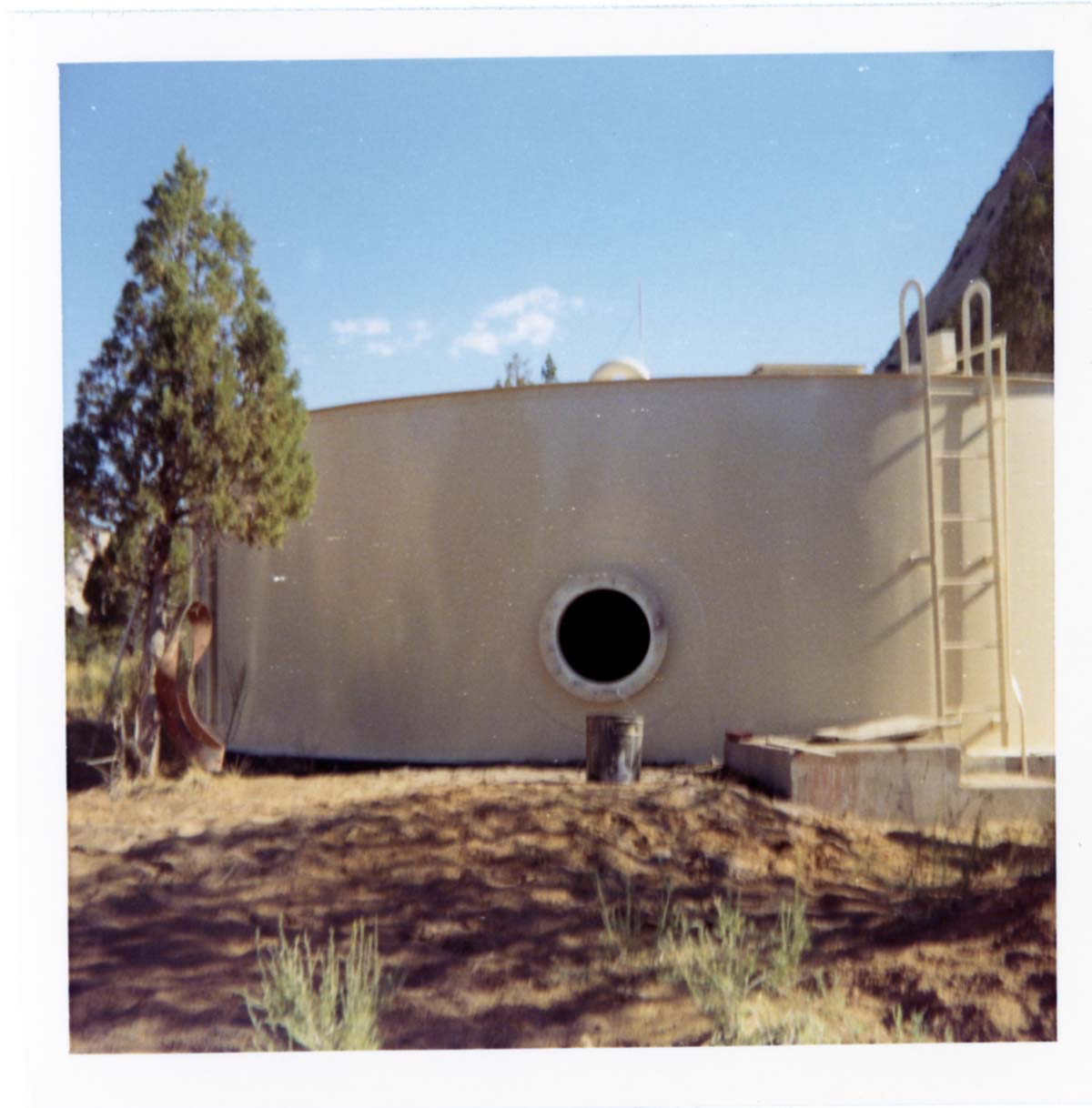 Repainting the exterior of the million gallon water tank at Birch Creek.