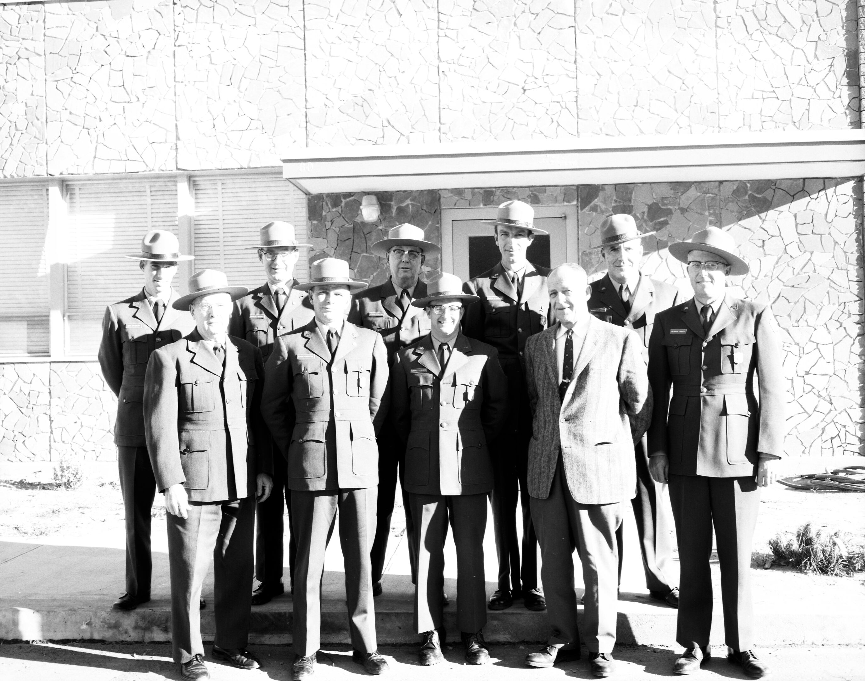 Ten uniformed personnel, in-service training. Left to right, back: John Bradbury, Charles H. McCurdy, James B. Felton, L. Hoener, Rudy Lueck; front: Carl E. Jepson, B. Hazeltine, R. Stevens, Superintendent Oberhansley.