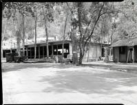 Rebuilding Zion Lodge after fire of January 28, 1966 - walls and ceilings of much of lodge in place.