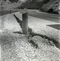 Wooden post in road crack during east side road repair and turn out construction.