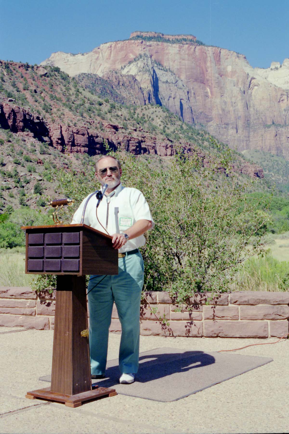 Color Photos of the parks 72nd anniversary celebrations- cake cutting, barbecue, speakers.