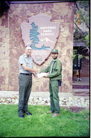 Color Photos of Superintendent Harold Grafe giving out awards to park personnel.