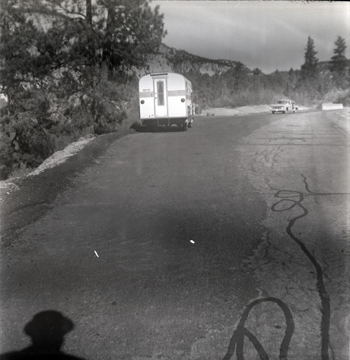 Trailer pulled over on turn out during east side road repair and turn out construction.
