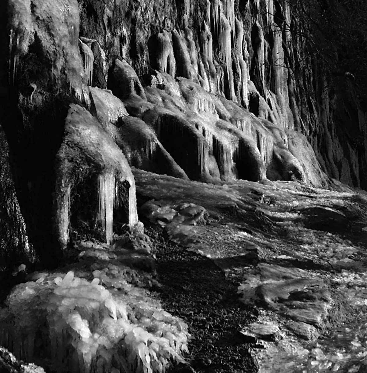 Weeping Rock in winter, covered in ice and icicles.