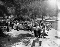 Superintendent Frank R. Oberhansley being served at barbecue following the dedication program at the Mission 66 Visitor Center and Museum. Utah Parks Company (Union Pacific Railroad) staff serving park employees and visitors. Over 600 people attended ceremony.