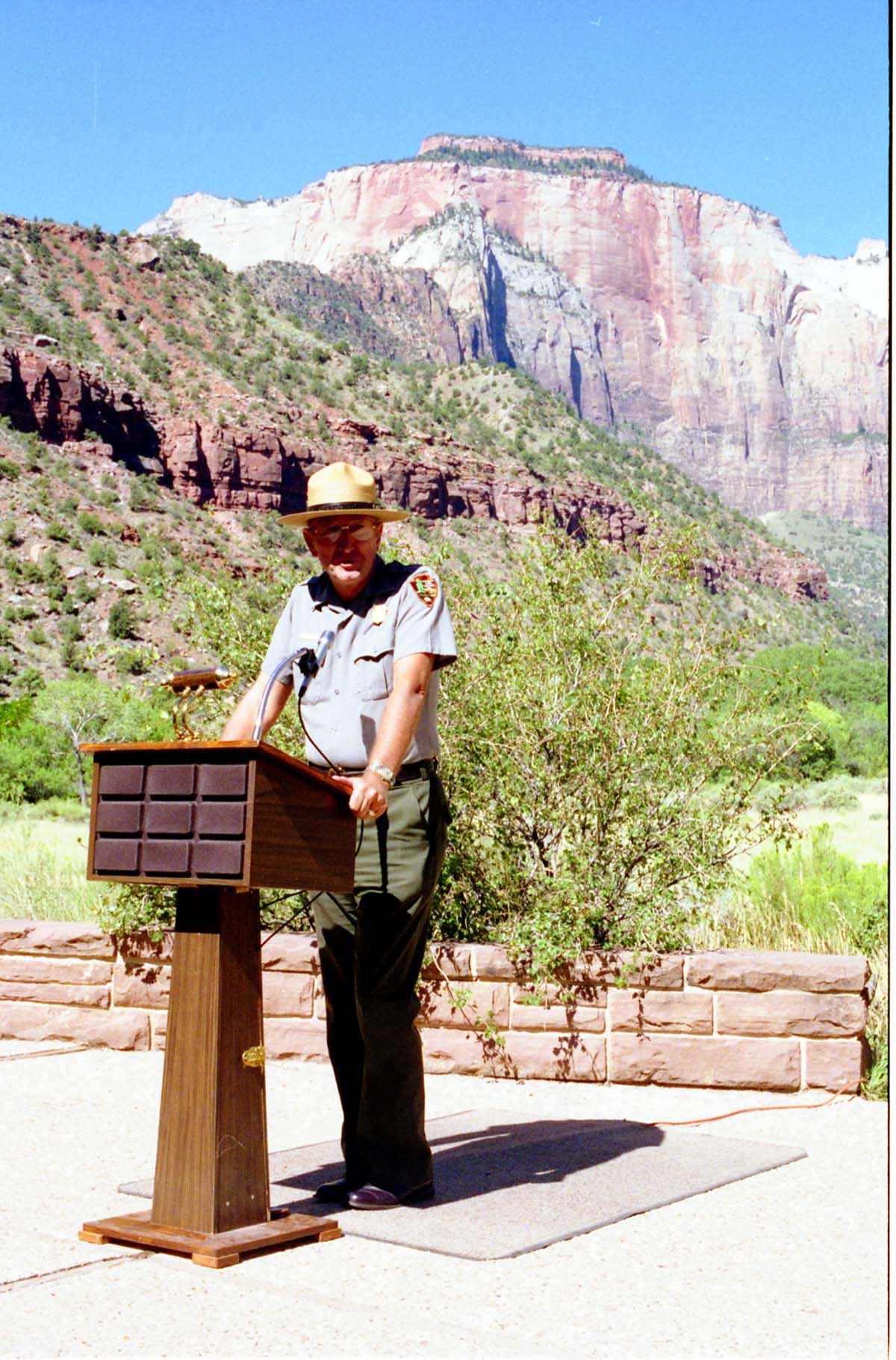 Color Photos of the parks 72nd anniversary celebrations- cake cutting, barbecue, speakers.