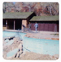 Workers during the destruction of the lodge pool and bathhouse.