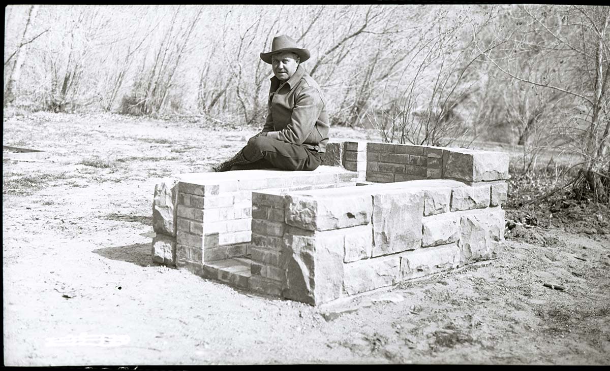 South Campground fireplaces with Dan Birch seated center.