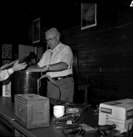 Owen Sanders with his display of old gadgets at third Folklife Festival at Zion National Park Nature Center, September 1979.