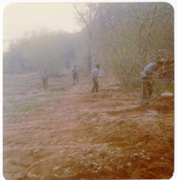 Workers uncovering the irrigation ditch in South Campground.