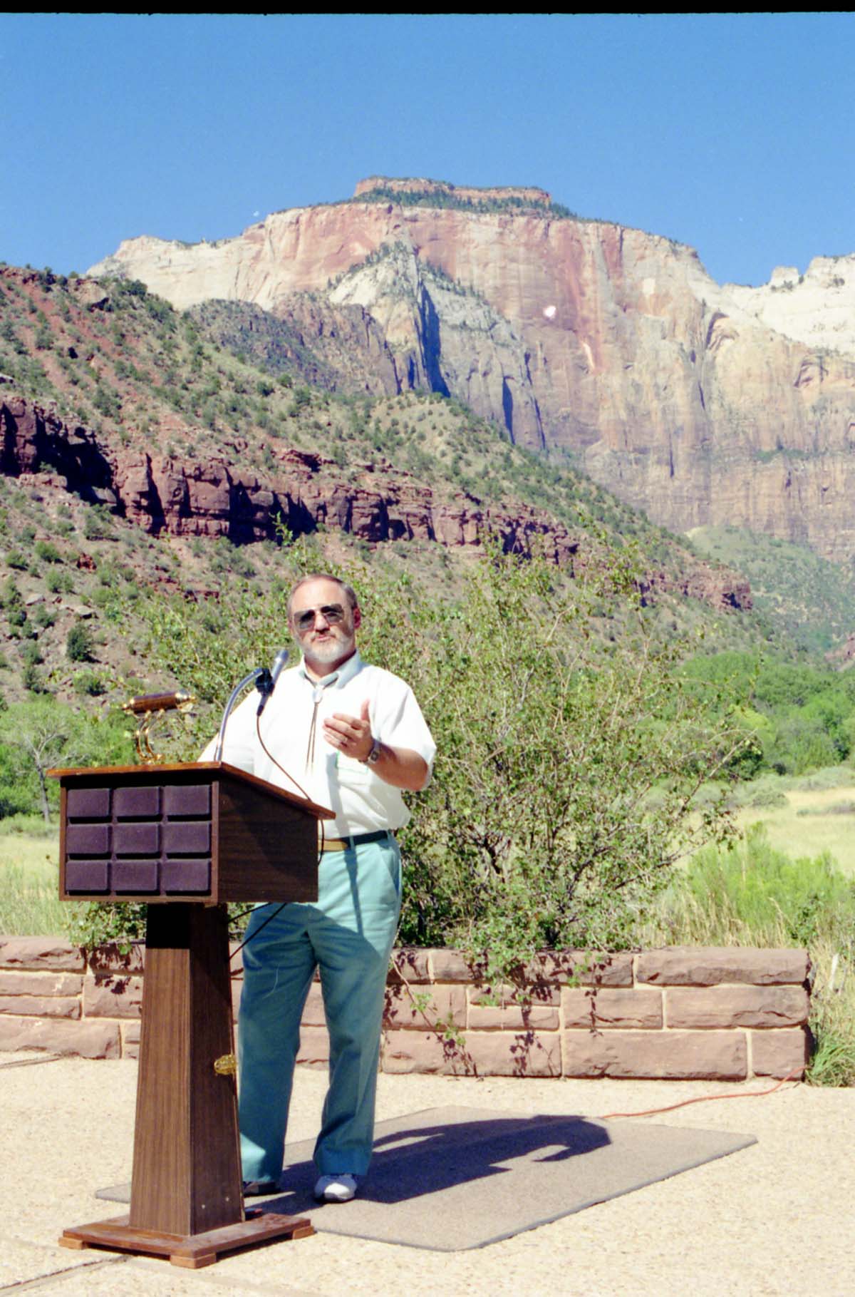 Color Photos of the parks 72nd anniversary celebrations- cake cutting, barbecue, speakers.