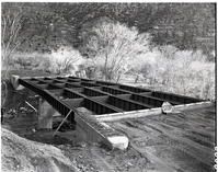 Oak Creek Bridge Construction showing steel spans in place, a significant development for Feb 1960.