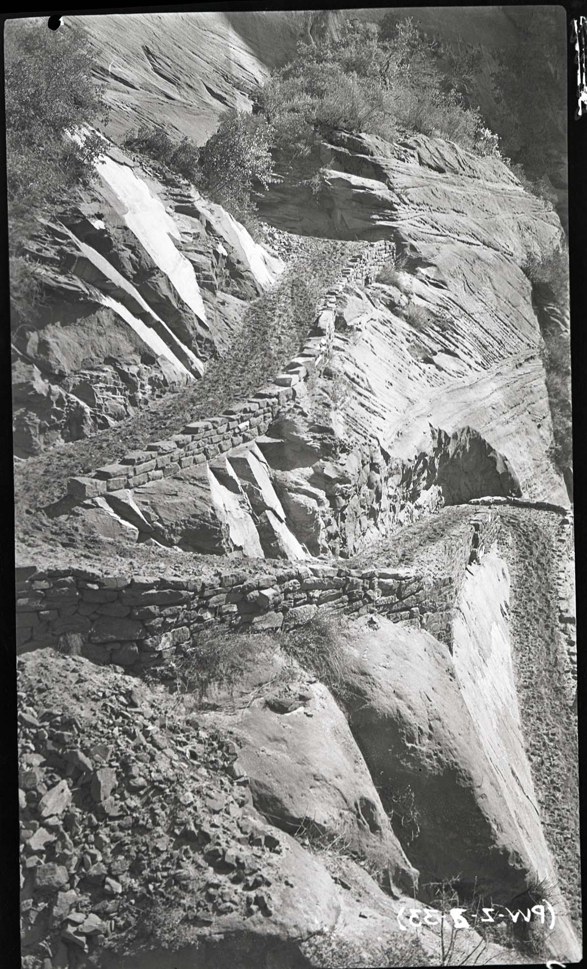 Construction on West Rim Trail with rock work and deep sand on switchbacks.