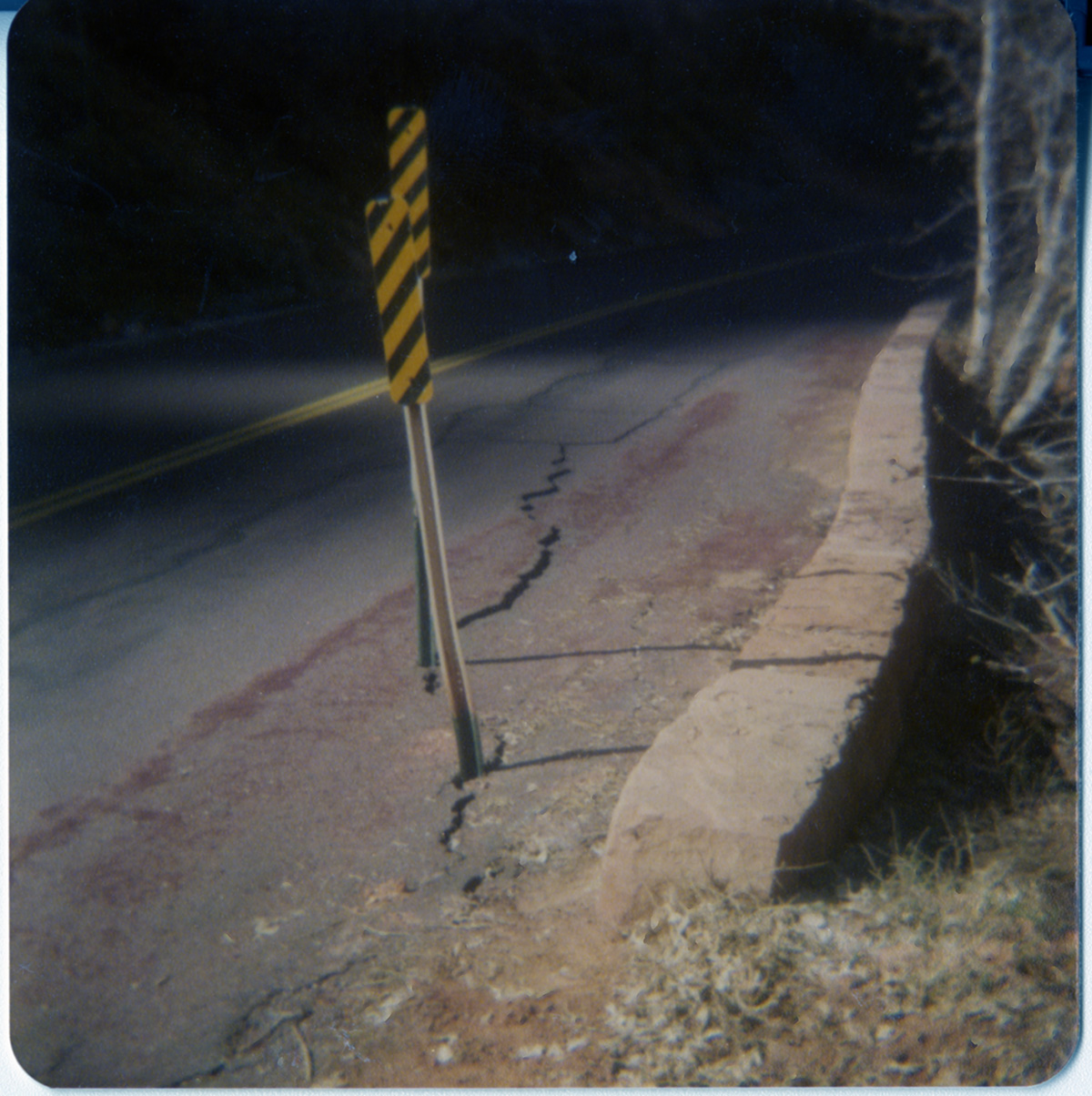 Black and yellow striped construction signs.