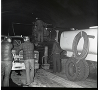 Worker works with drill rig during test hole drilling in Zion-Mt. Carmel tunnel.