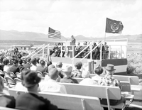 Gerreld L. Pulsipher, Director of the Utah Travel Council, addressing visitors from podium at dedication of Taylor Creek road (Kolob Canyons).