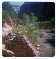 Men working on the emplacement of the new Zion Lodge footbridge.