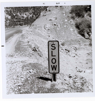 Road sign reading 'SLOW' in Kolob Canyon.