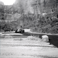 Tractor performing road work on the Great White Throne parking area.