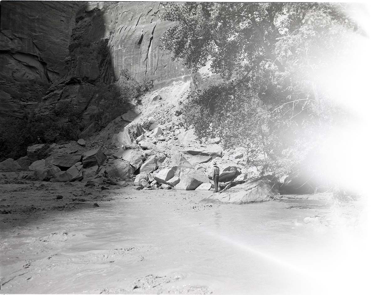 BW photo of a rock slide along the Narrows Trail.