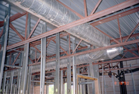 Ceiling piping during the construction of headquarters addition.