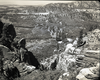 Record of vandalism, a half mile west of Neck Spring, Lee property beyond pine trees. Water matters involving Evan S. Lee.